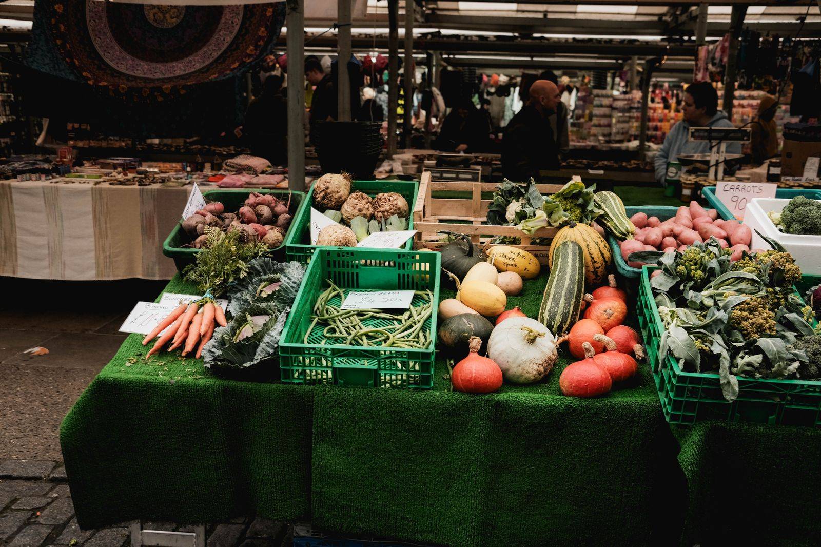 Fresh vegetables and produce at a weekend farmers market stall