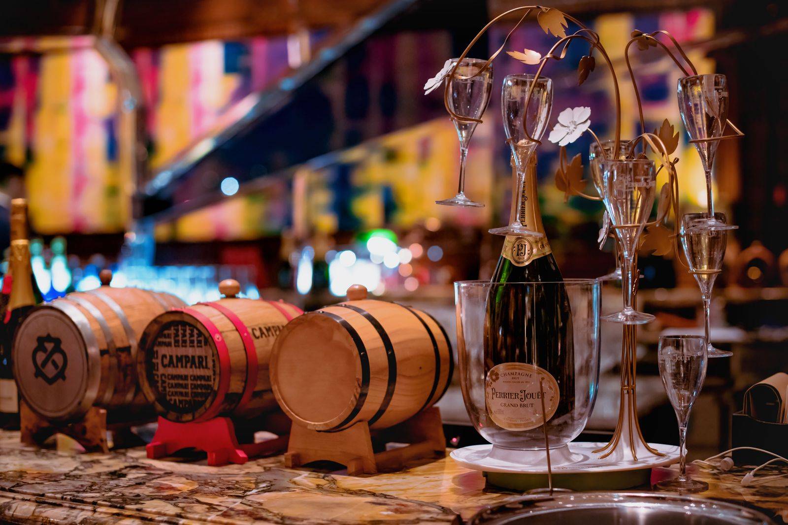Wine glasses lined up for a tasting in a Niagara winery barrel room