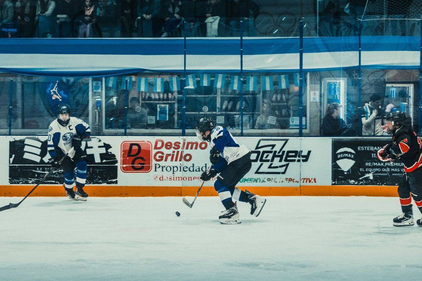 A hockey arena crowd under the lights before a game in Toronto