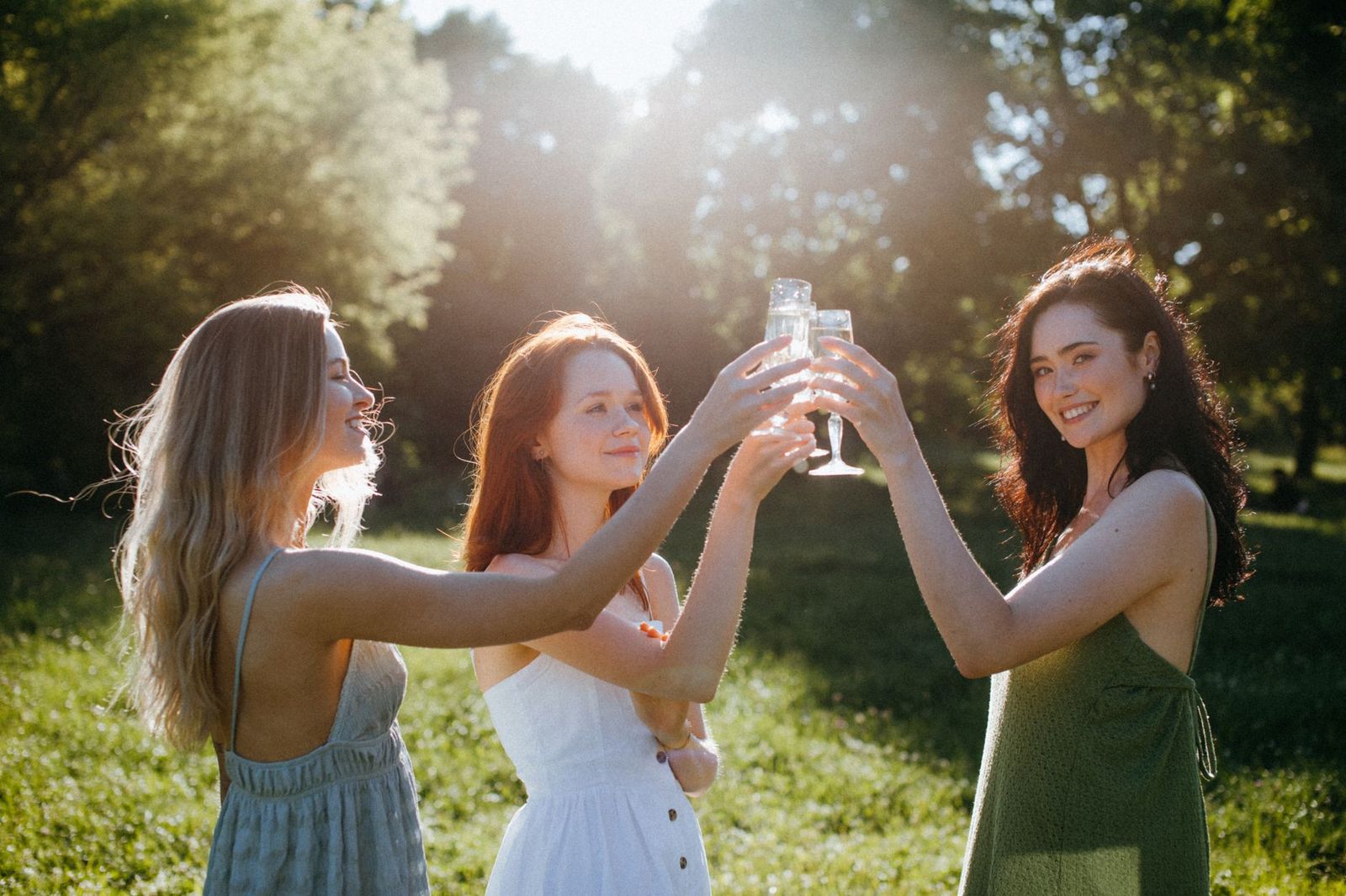 Friends raise glasses at a rooftop bar in Toronto during a bachelorette night