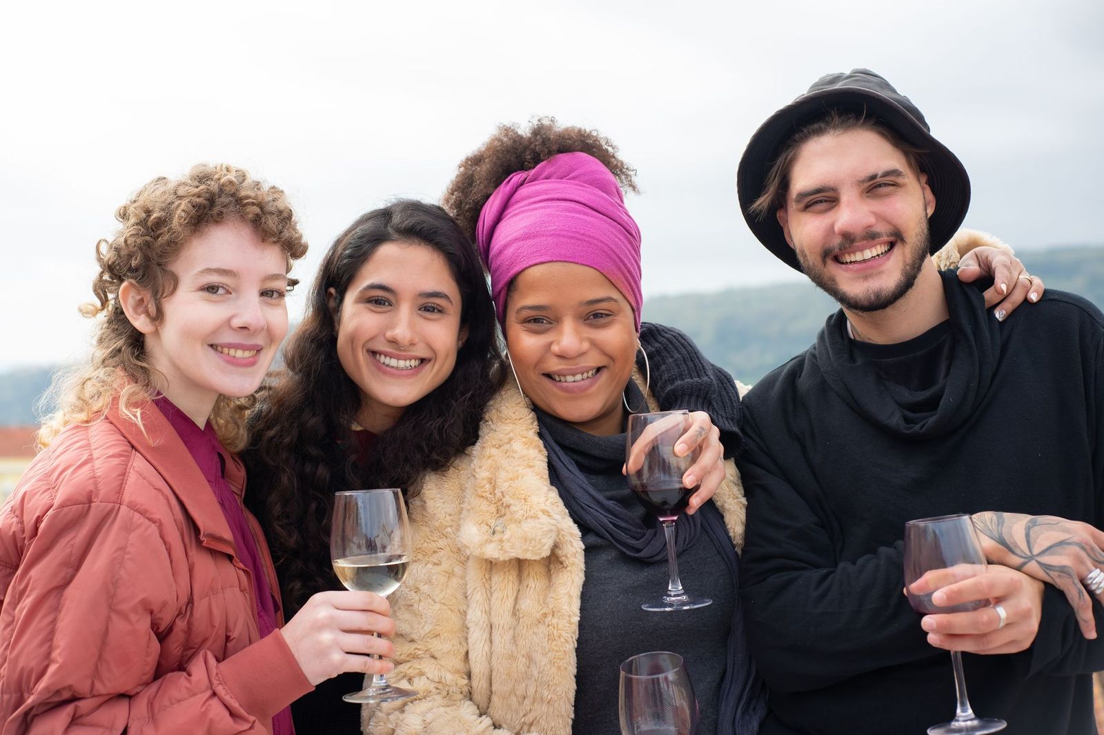 A group of women at a vineyard tasting during a Niagara bachelorette day