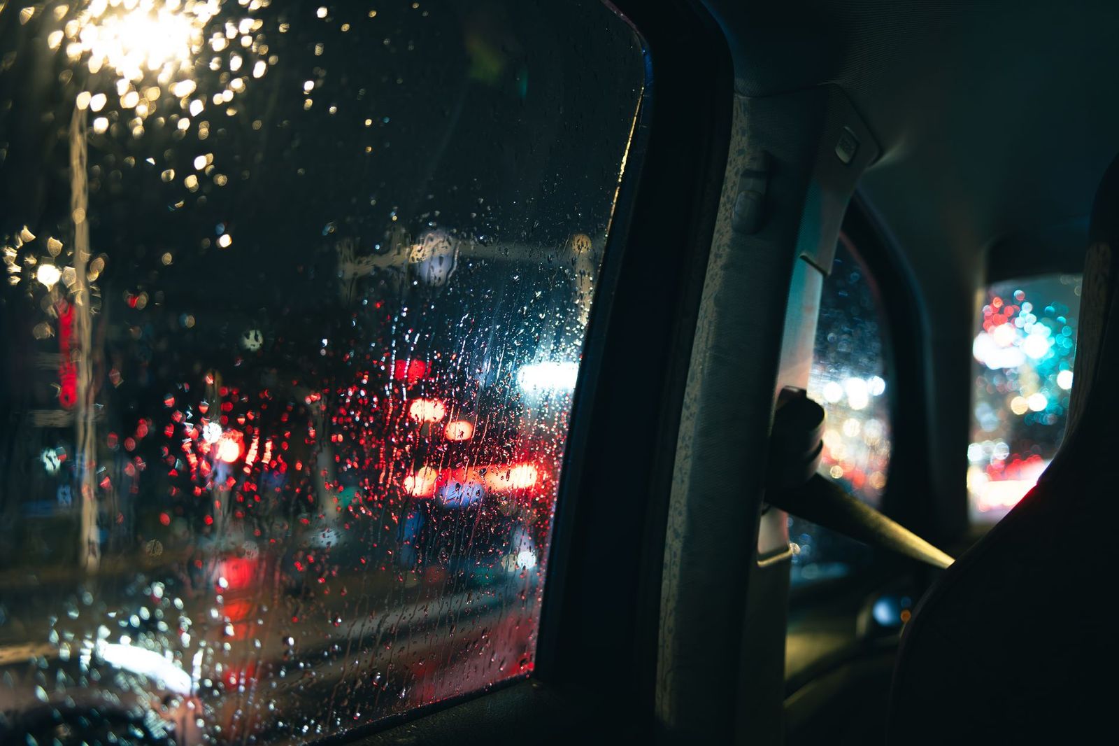City lights seen through a car window on a birthday drive through Toronto