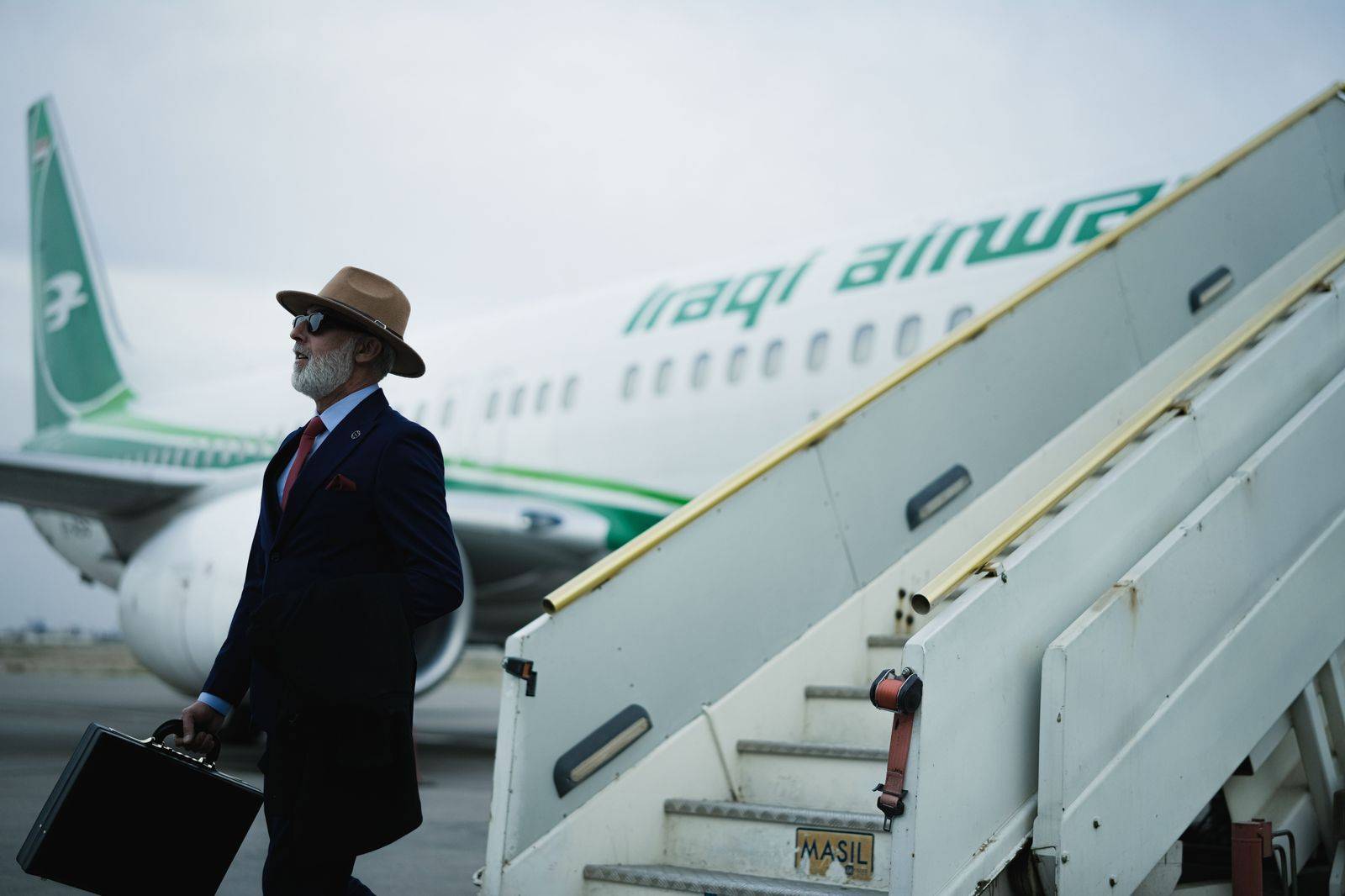 A business traveller with a carry-on at the airport, the typical same-day visitor to Brantford
