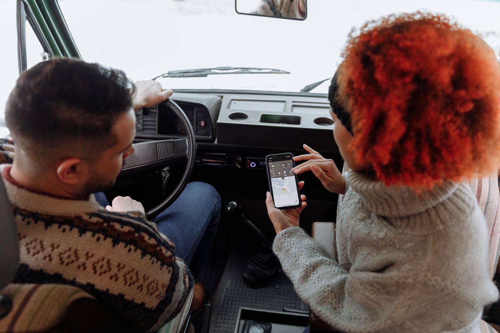 Phone showing a traffic map in a car approaching the border