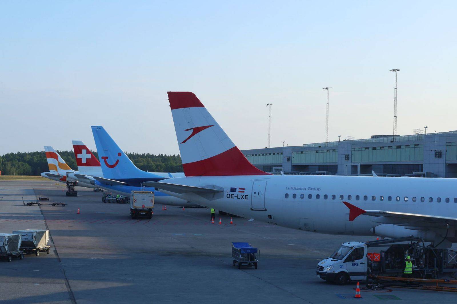 The departures level at an airport terminal on a quiet morning