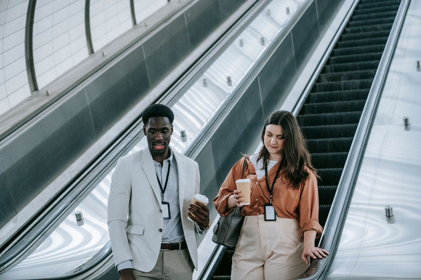 Business visitors with lanyards in a conference lobby at a Mississauga trade show