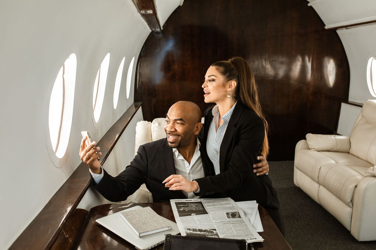 Leather seats inside a business jet cabin before a flight from Toronto