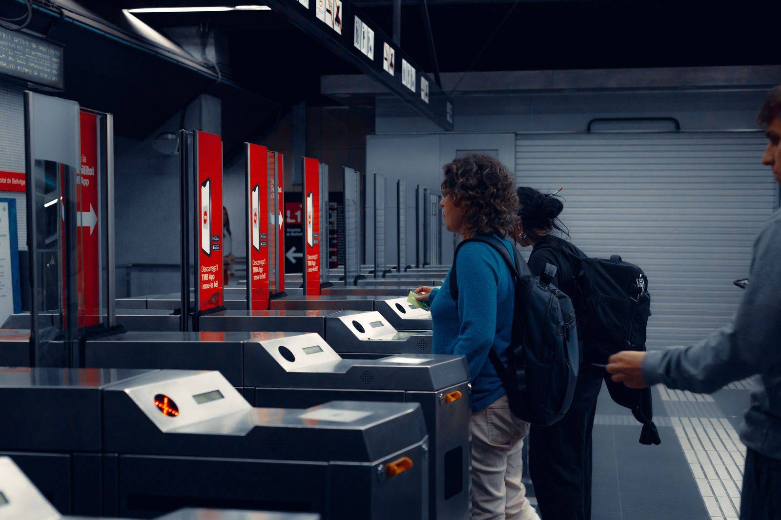 Passengers in an airport screening area, where NEXUS members can use expedited lanes where available