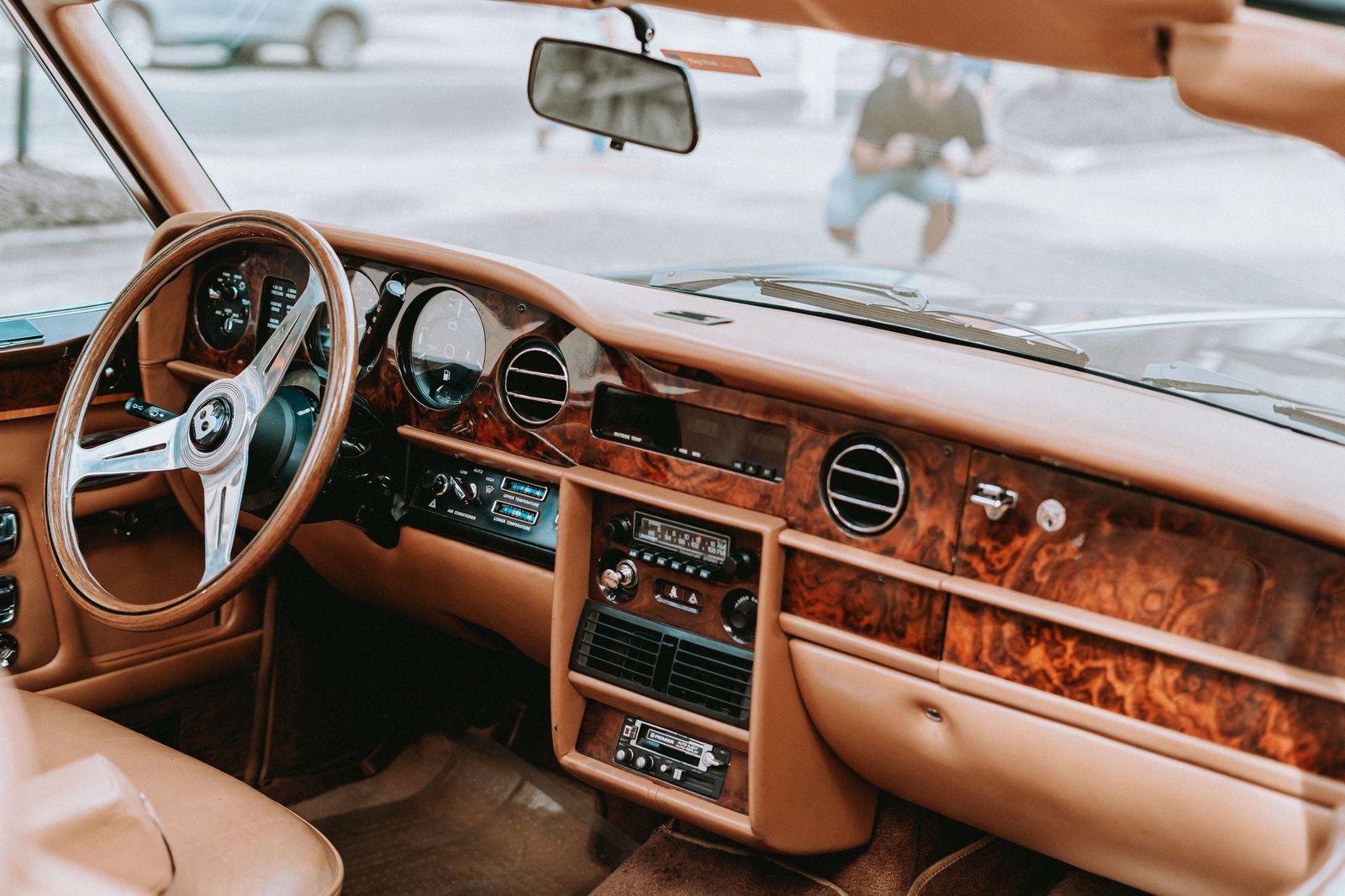 Leather captain's chairs inside a luxury van ready for a long-distance drive