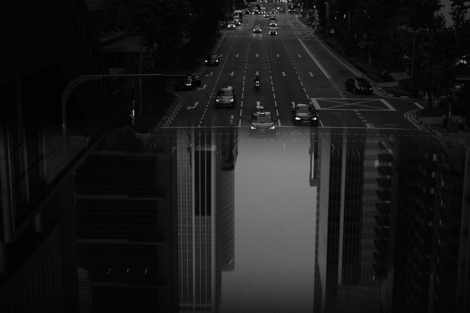 A black SUV waiting on a Toronto street at night after a rooftop bar evening
