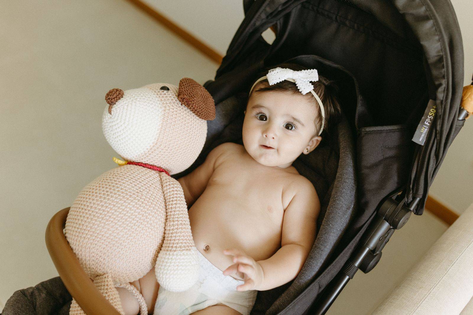 Newborn baby sleeping in an infant car seat ready for the ride home