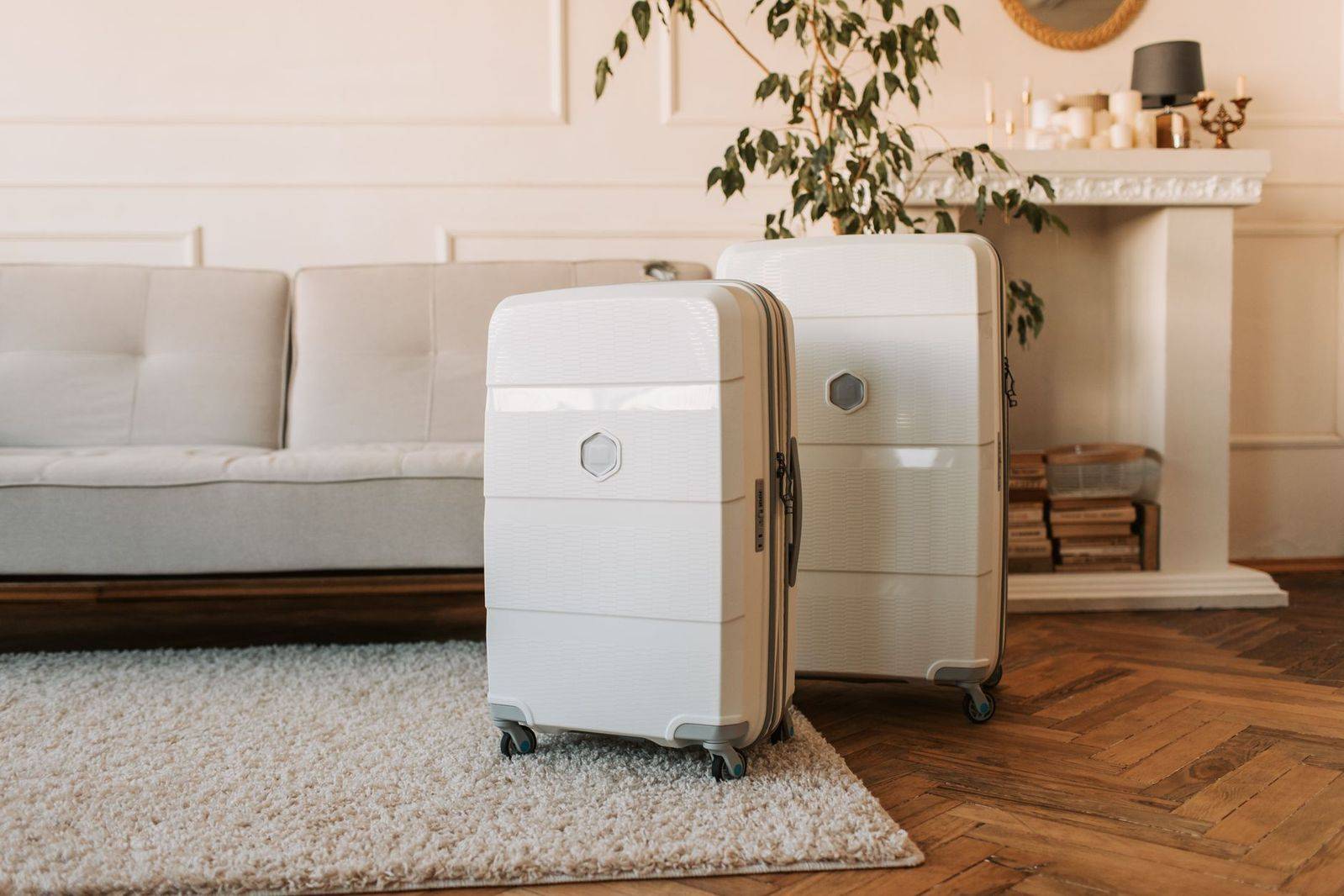 Suitcases loaded neatly in the back of a passenger van before an airport run