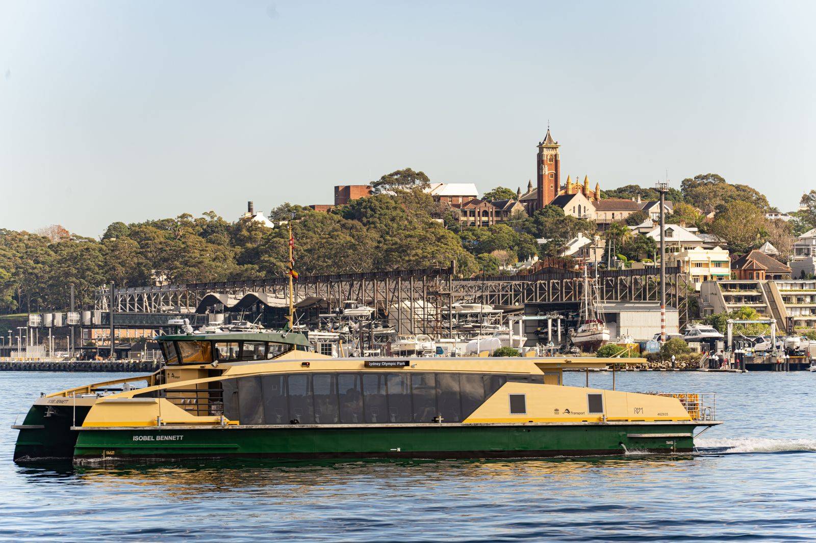 A ferry crossing the harbour toward the city waterfront