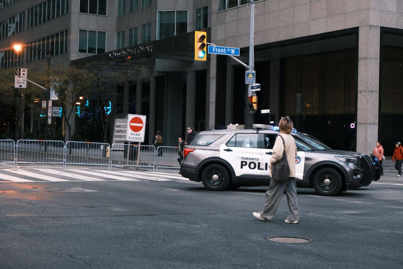 A black sedan on a downtown Toronto street a few minutes from the island airport