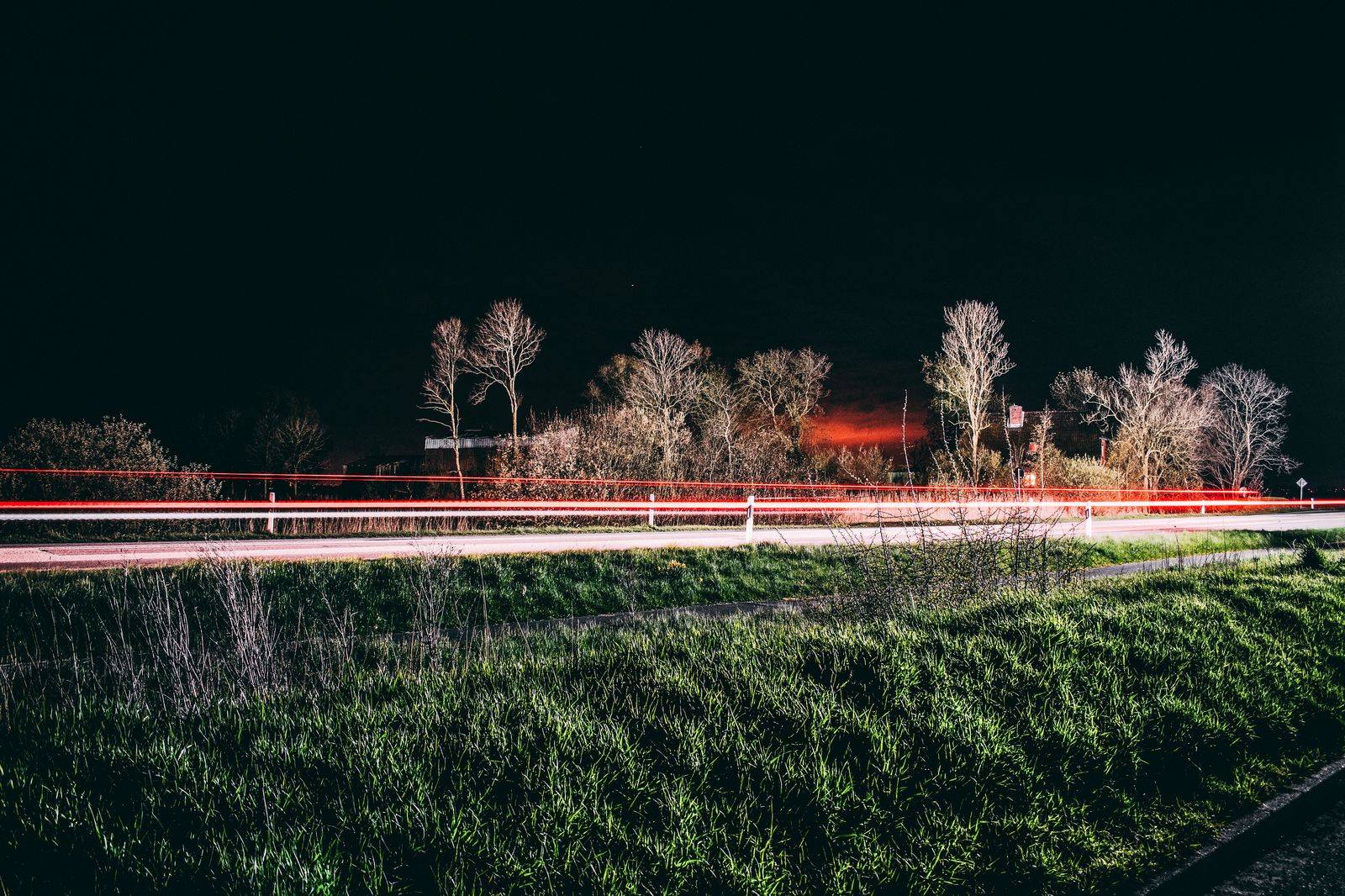 Headlights on a dark country road at night, the kind of drive home from Port Perry best left to a chauffeur