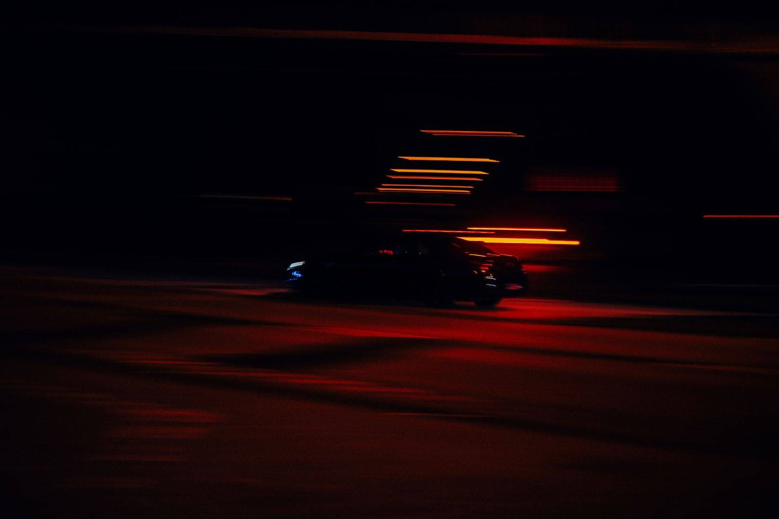 A black car on an evening highway, the 401 east toward Pickering