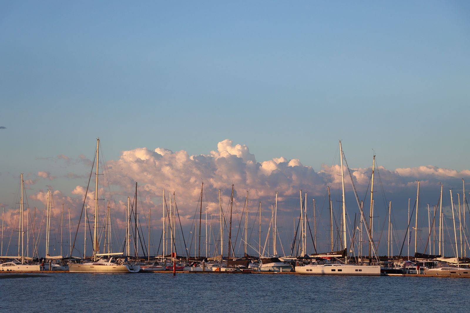 Sailboats in a marina on a calm evening, typical of the Bay of Quinte waterfront