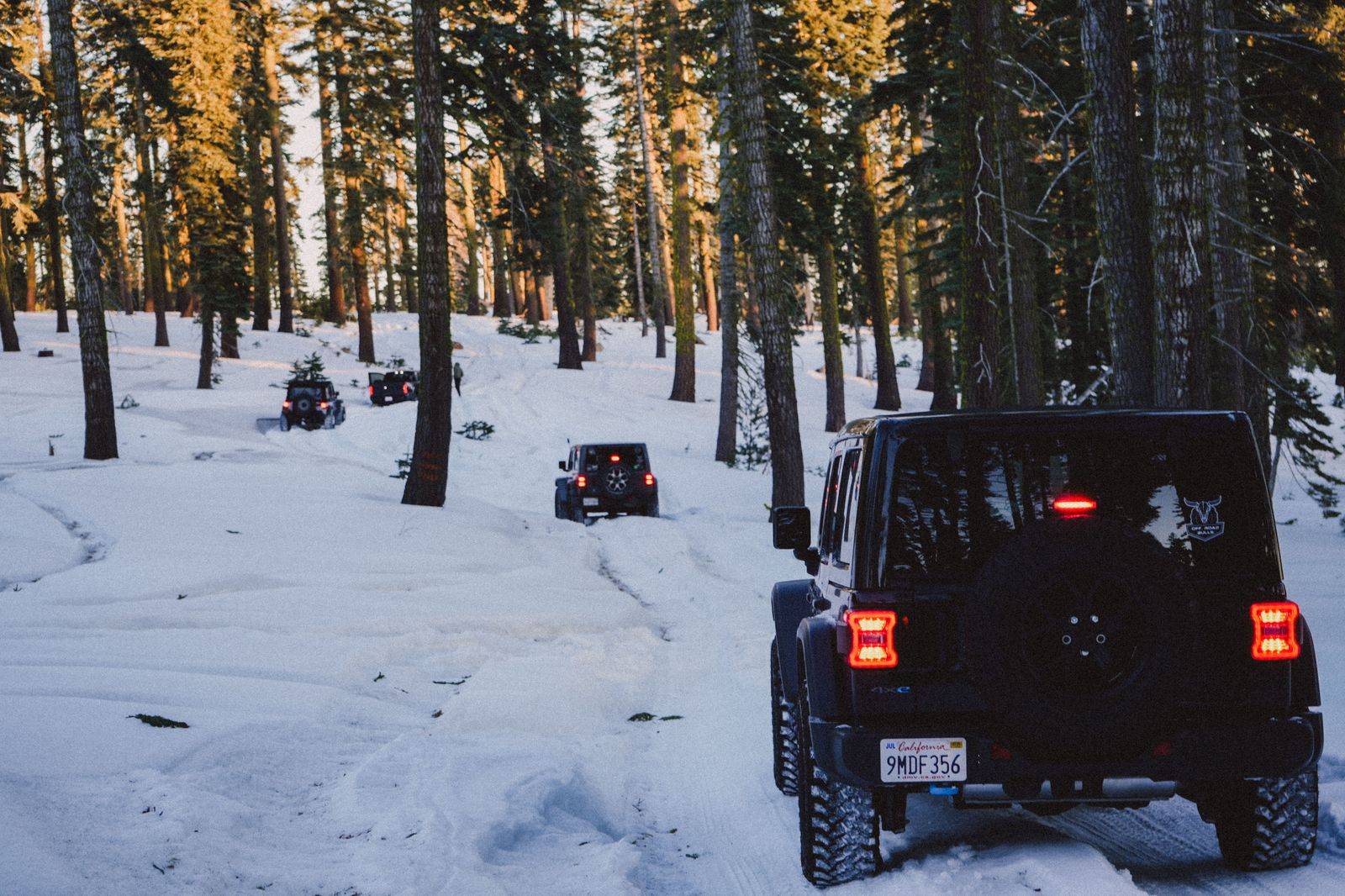 A black SUV on a snowy road near Collingwood in winter