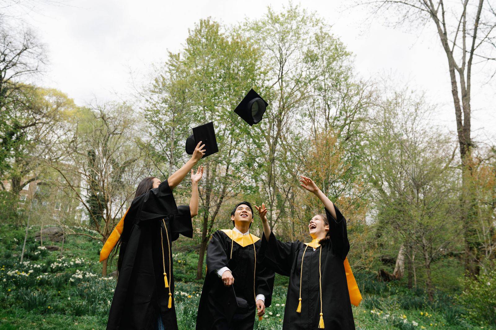 Graduates celebrating after convocation: families often keep a chauffeur by the hour for the whole day