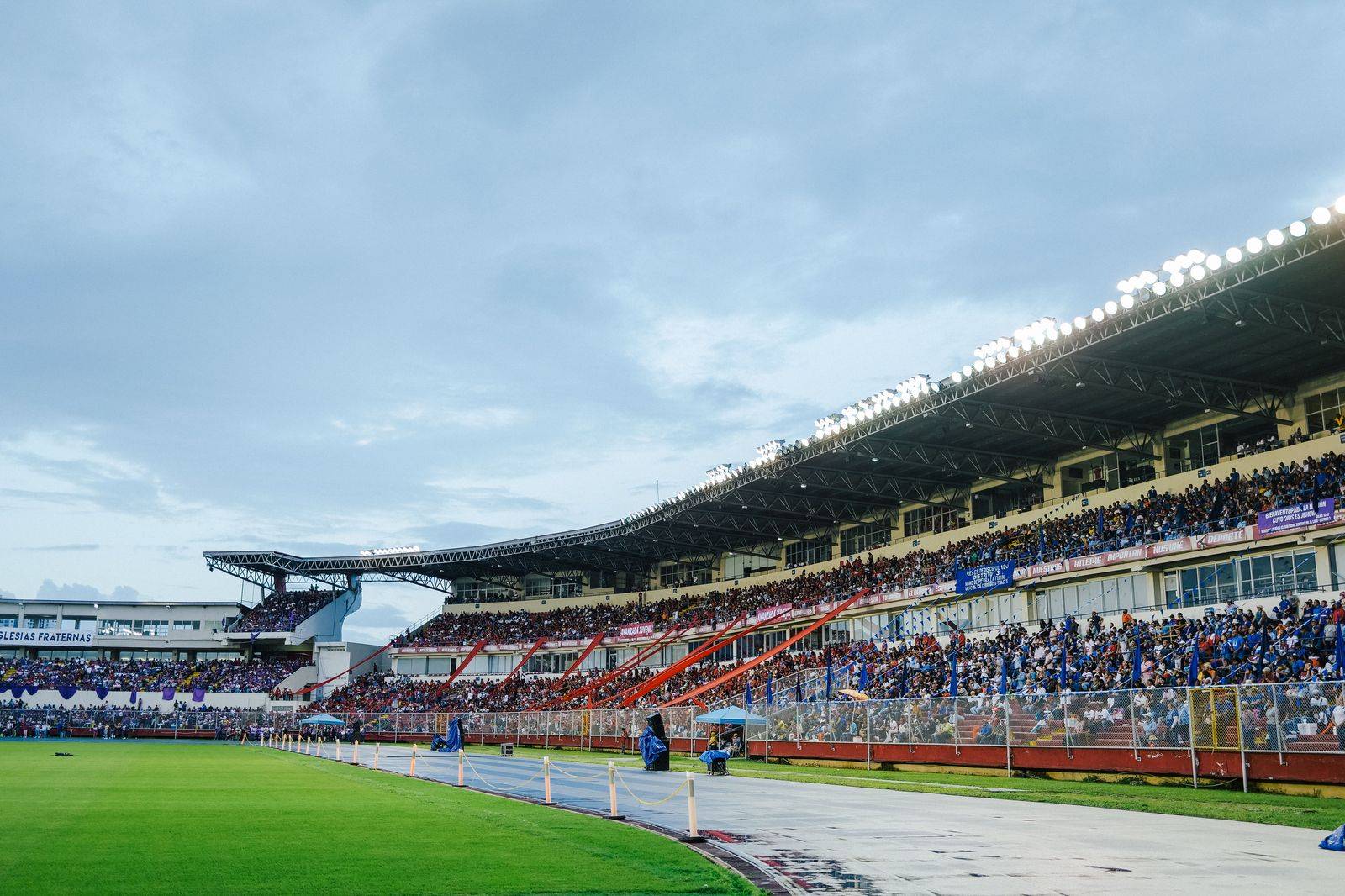 Game-night crowds at a stadium: an hourly chauffeur waits nearby and meets you at an agreed pickup point