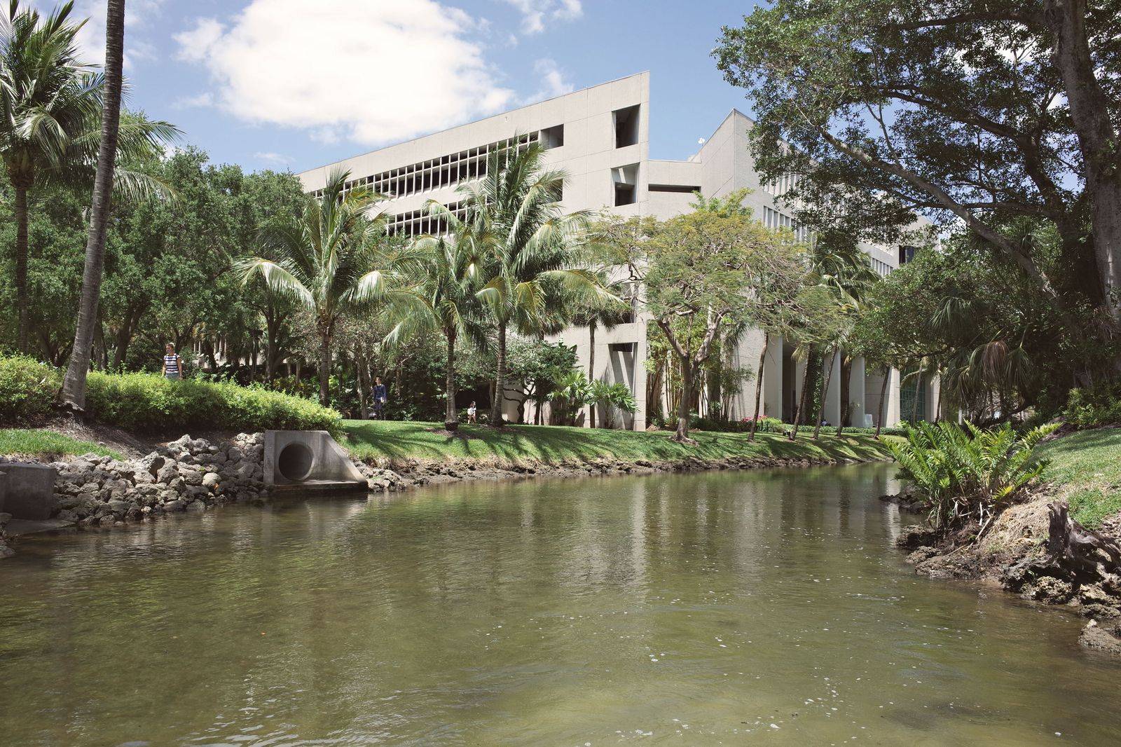 A riverside university campus in autumn, the kind of move-in drop-off our Peterborough chauffeurs handle each September