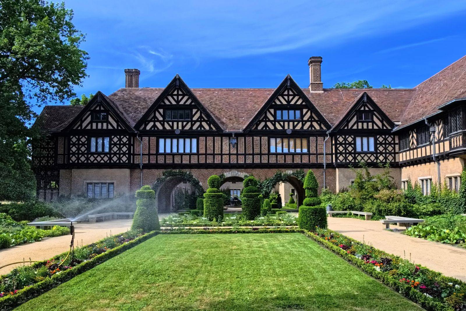 A historic mansion and formal garden on a country estate