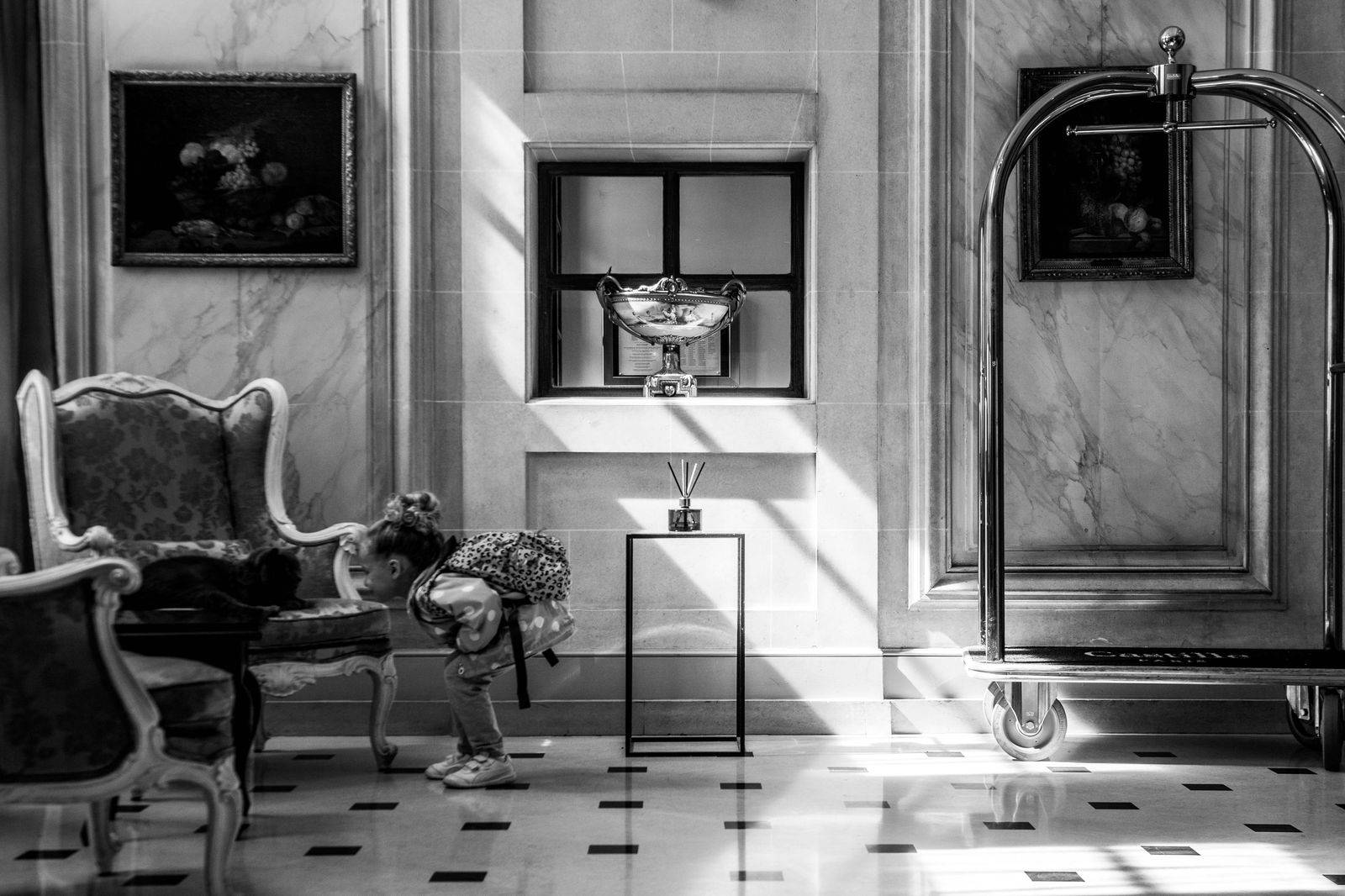 Hotel lobby with luggage cart as a Toronto chauffeur arrives for a guest
