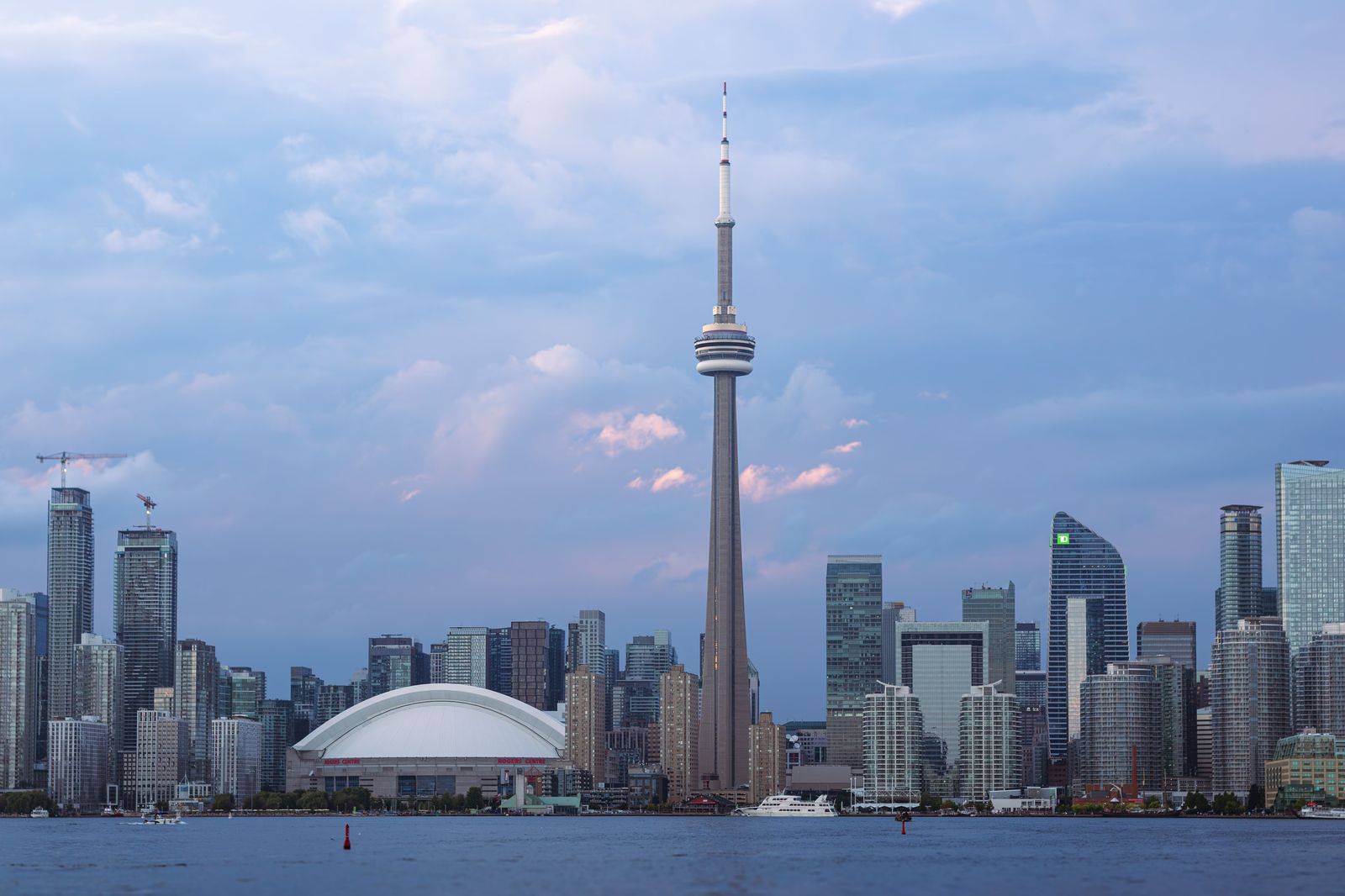 The CN Tower and the south core skyline at dusk, the neighbourhood around Rogers Centre
