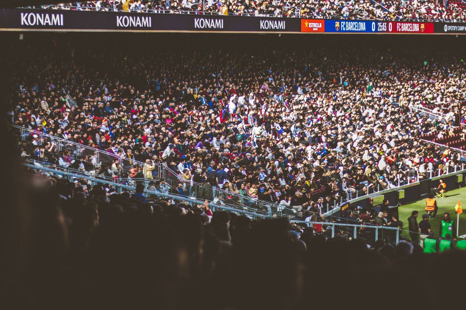 Fans in the stands at an open-air stadium on the Toronto waterfront