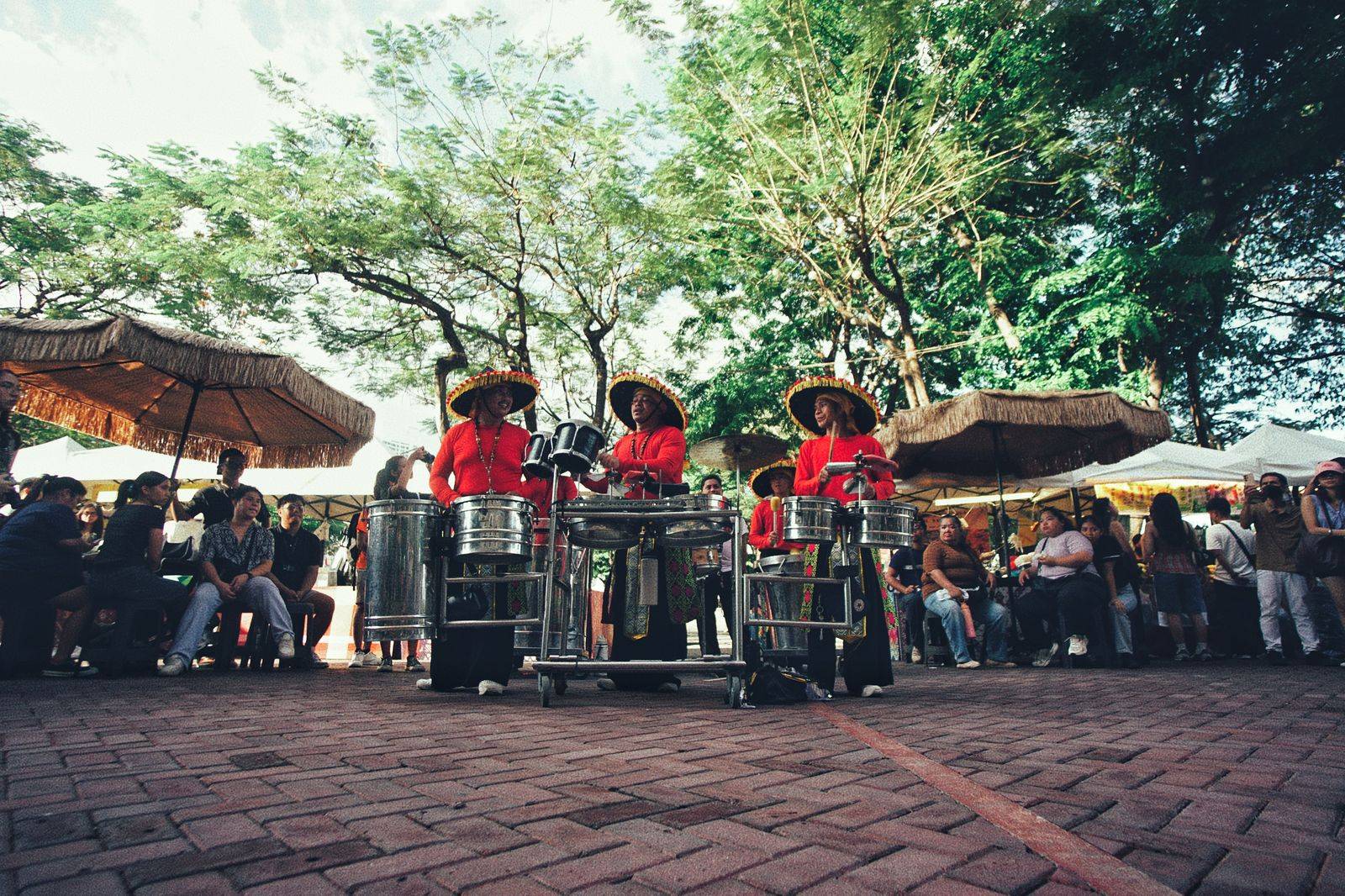 Steel drum players performing at a summer street festival