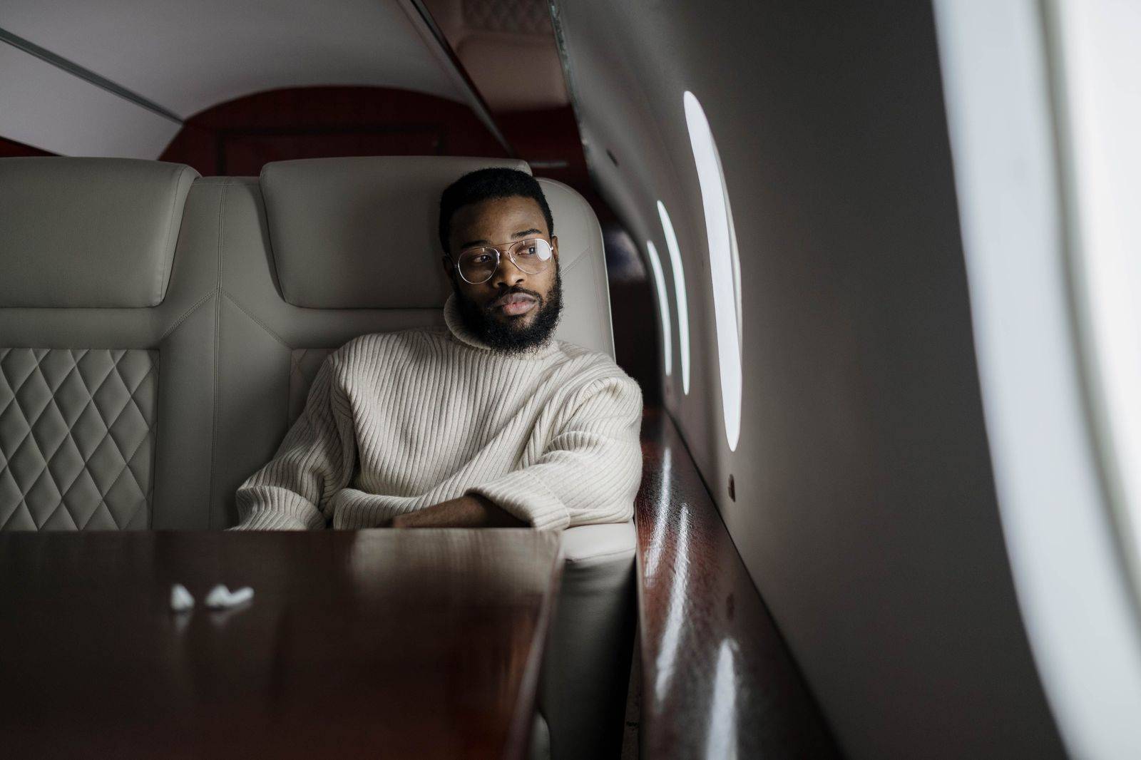 Leather seats inside a business jet cabin before a Toronto arrival