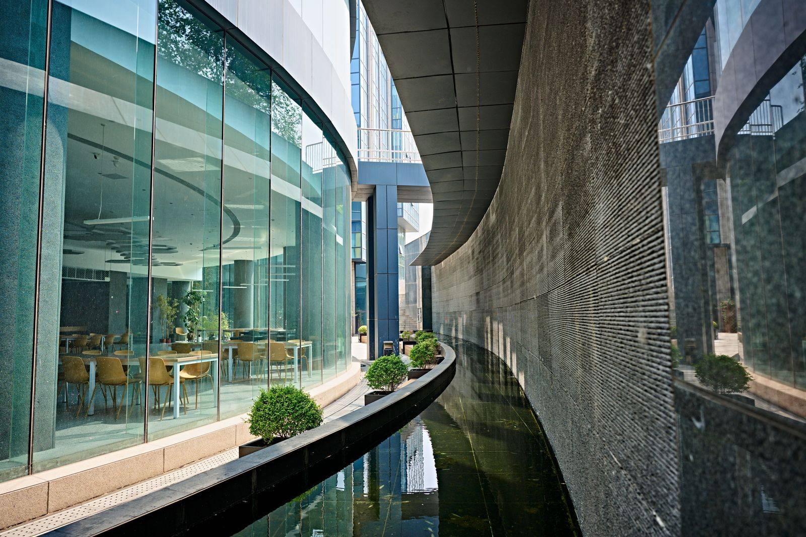 A modern glass office campus in a technology district