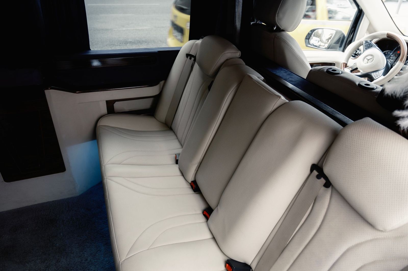 Leather lounge seating inside a chauffeured Mercedes-Benz Sprinter van in Toronto