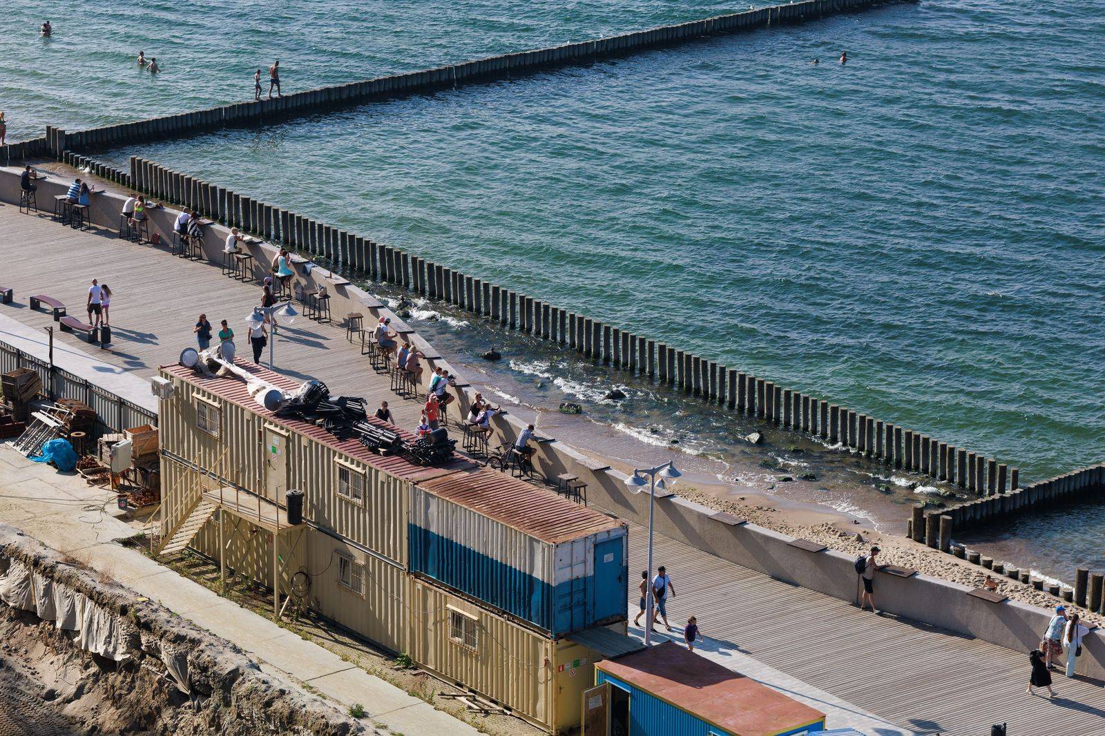 Visitors walking along the Toronto waterfront on a first trip to the city