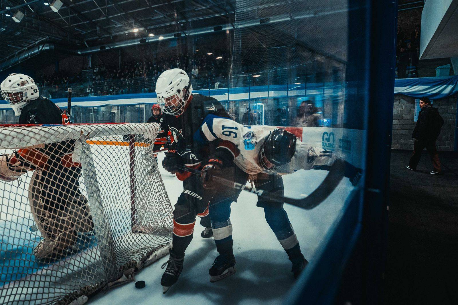 A hockey arena crowd under the lights, like game nights in Oshawa