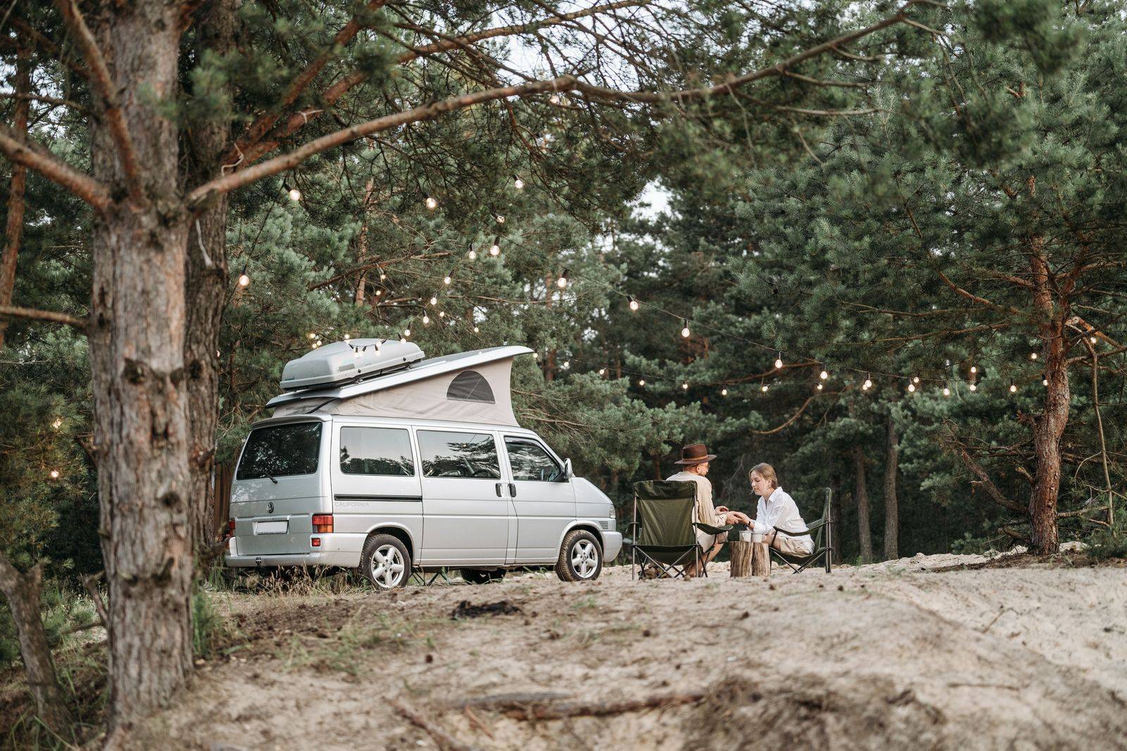 A family loading luggage into a van before a long drive from Toronto to Quebec City