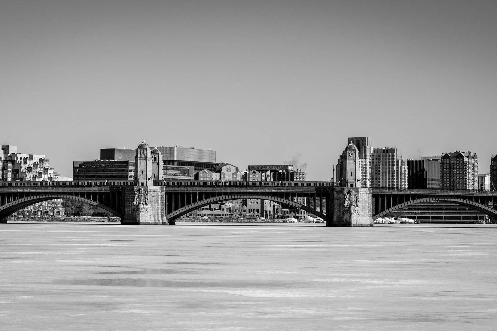 The Detroit skyline and a river bridge seen from the Windsor side
