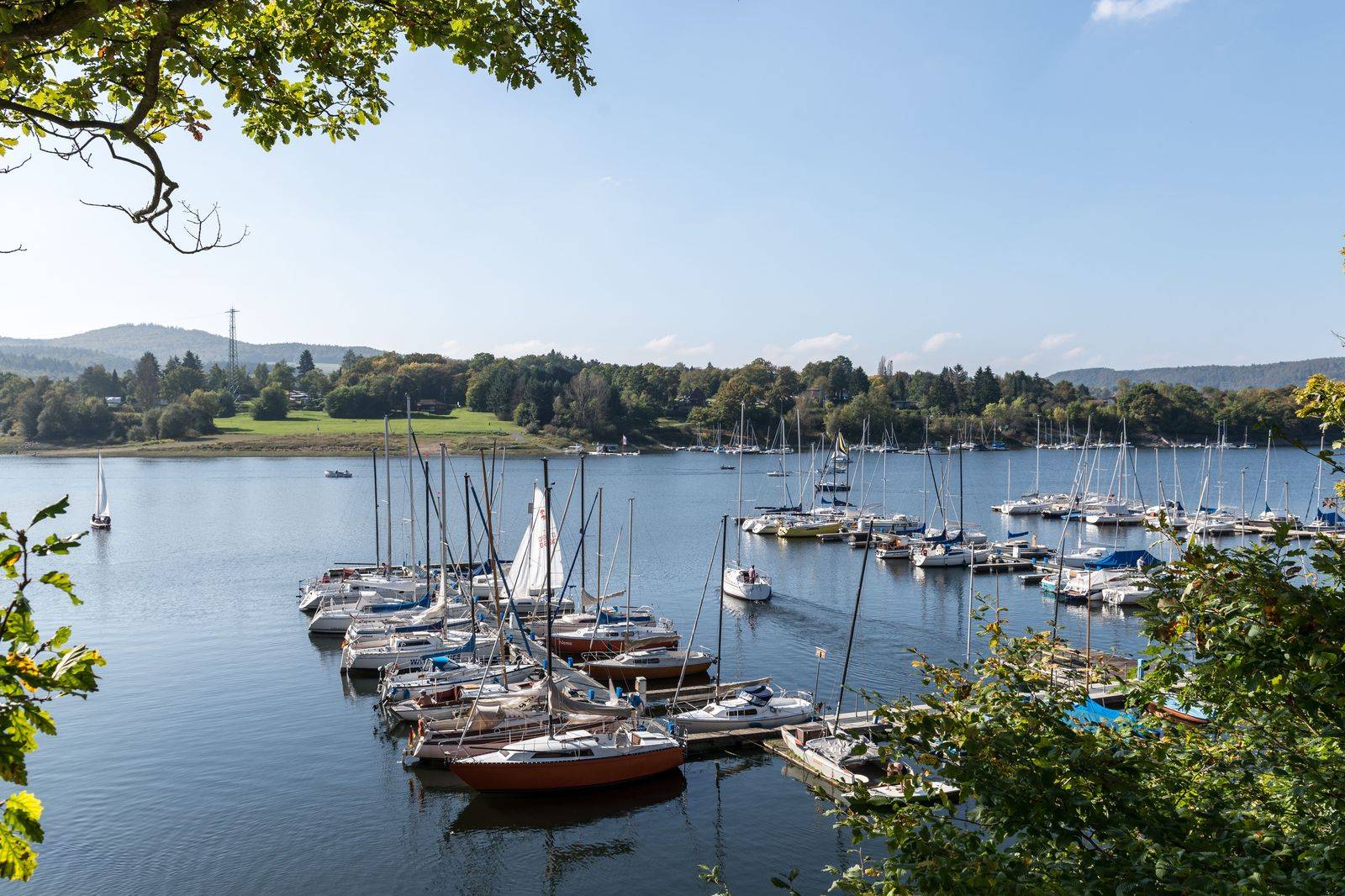 Sailboats in a lakeside harbour in Oakville, a short drive from the station