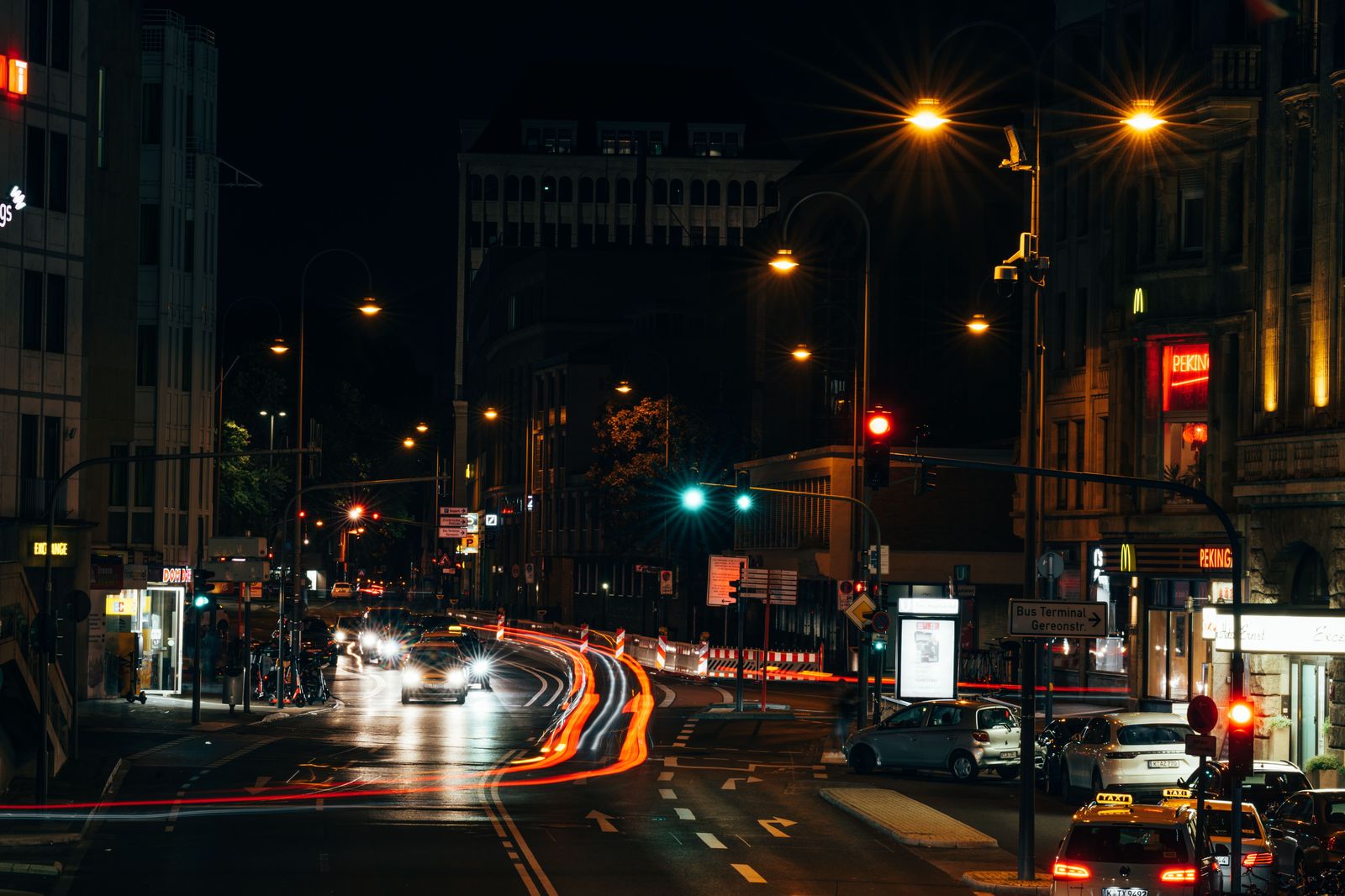 Downtown Toronto street at night with traffic and city lights